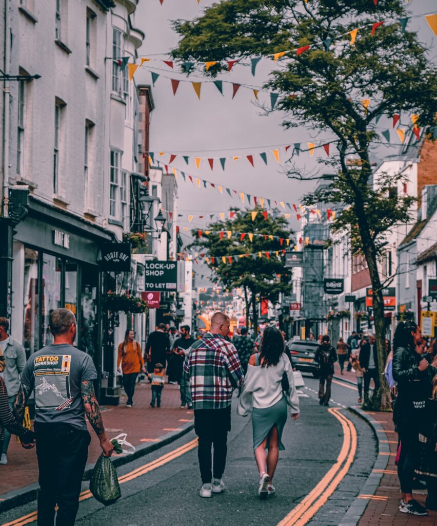 Brighton people walking. Going back to work after summer holidays. Physio related blog