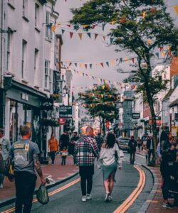 Brighton people walking. Going back to work after summer holidays. Physio related blog